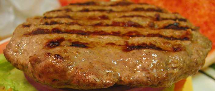 Hamburguesa con queso y vegetales